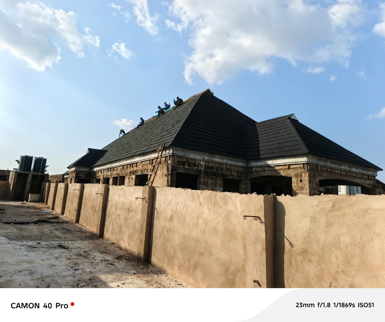 Roofwell luxury residential project with classical columns and stone-coated roof