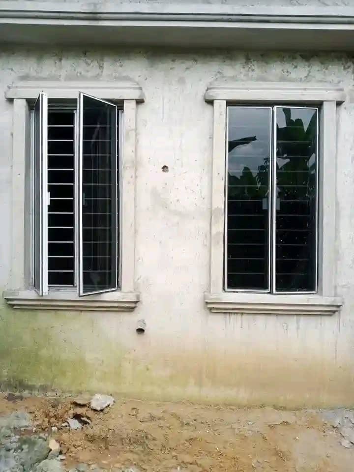 Red architectural entrance — curtain wall